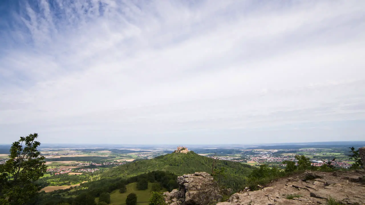 Timelapse image of clouds in the landscape with Hohenzollern Castle