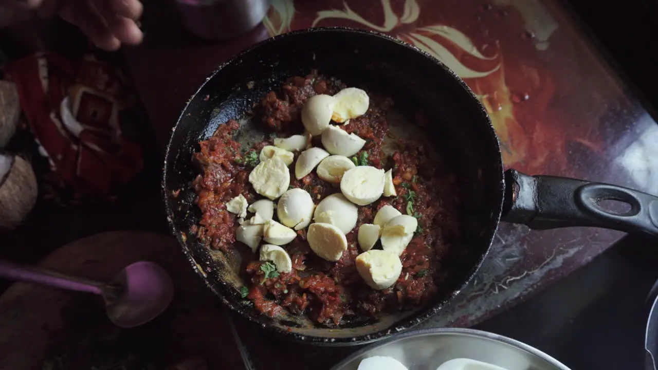 egg bomb recipe boiled egg yoke in masala cooking fillings pan Indian spices deviled eggs