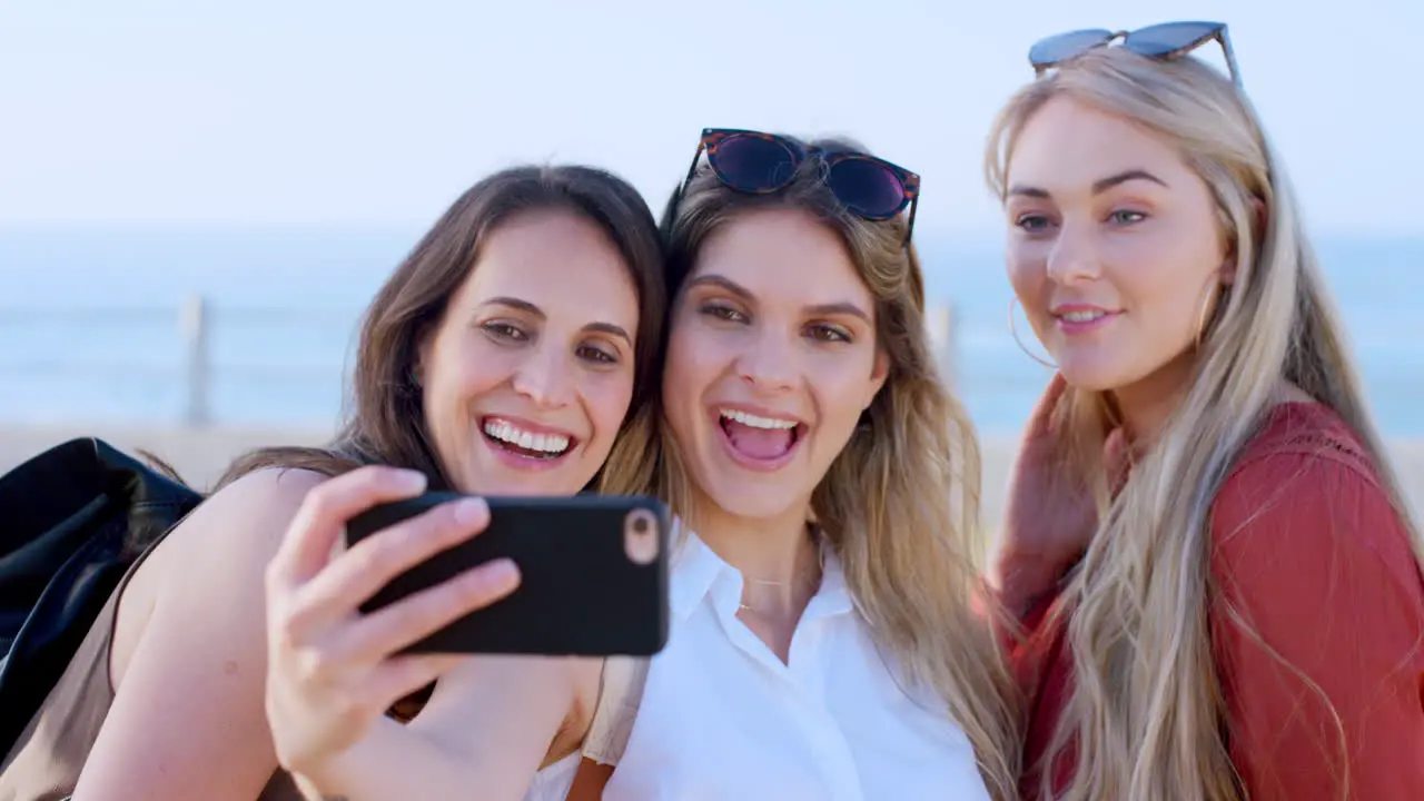 Women phone and beach selfie for social media