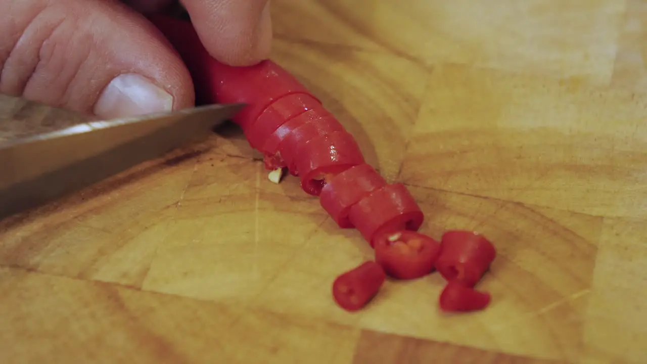 Motion controlled shot of cutting a pepperoni