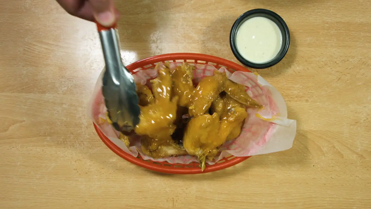 Top Shot Of Cheesy Chicken Wings With Mayonnaise