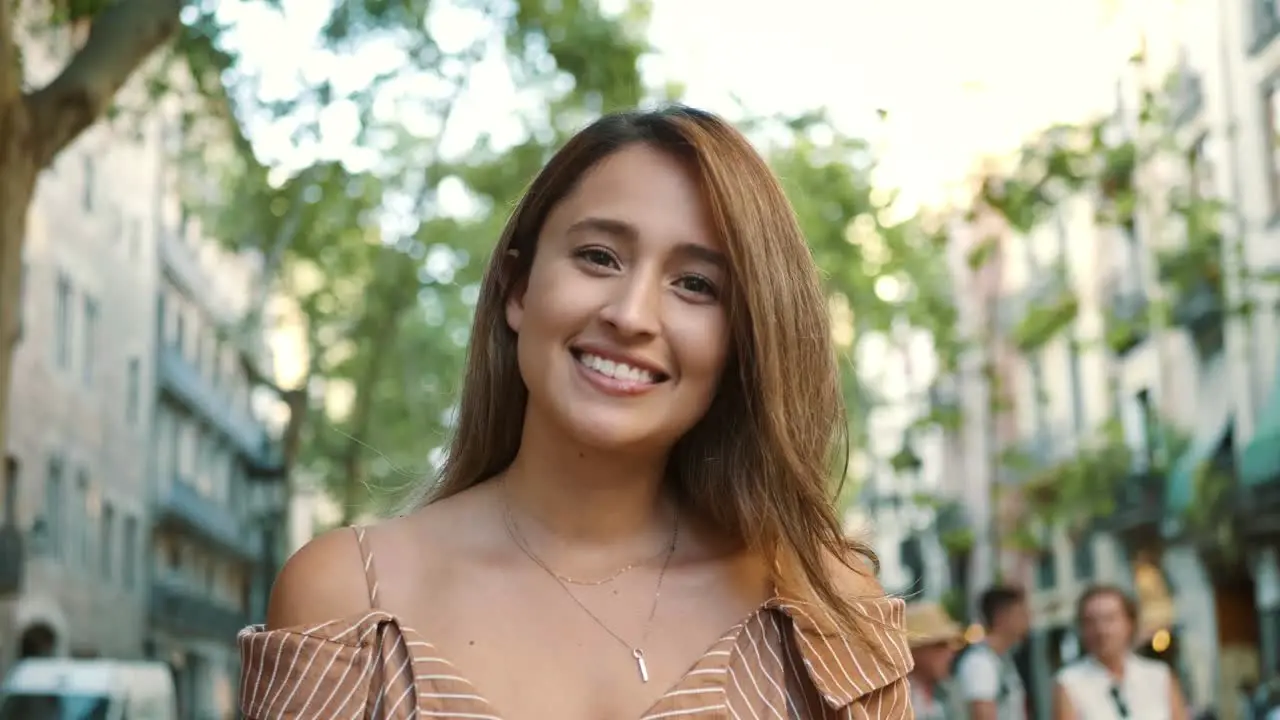 Portrait of joyful woman smiling outdoor Close up happy girl posing on camera