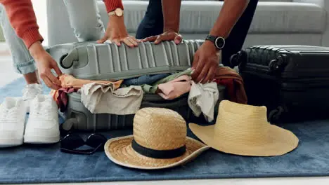 Travel hands of people pack full suitcase