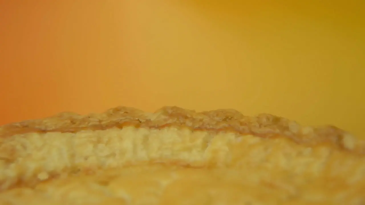 [Camera Used Canon C300] Close-up rotating pie crust