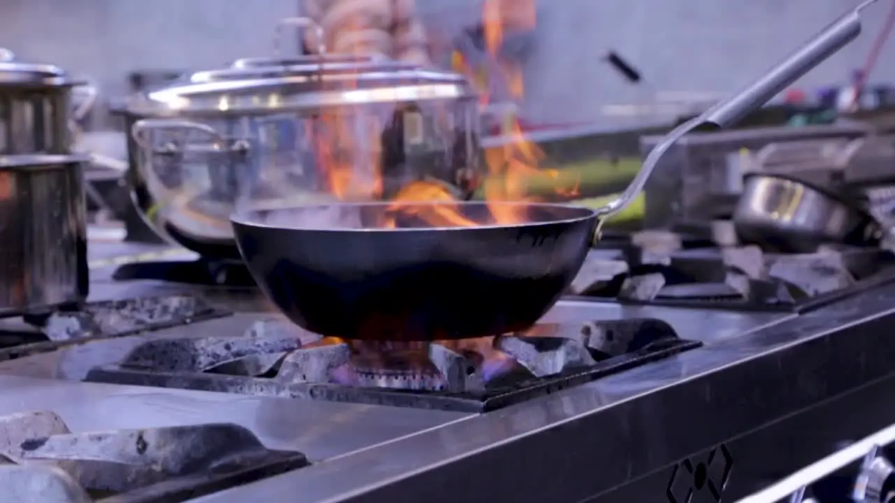 Flaming Frying Pan On Stove