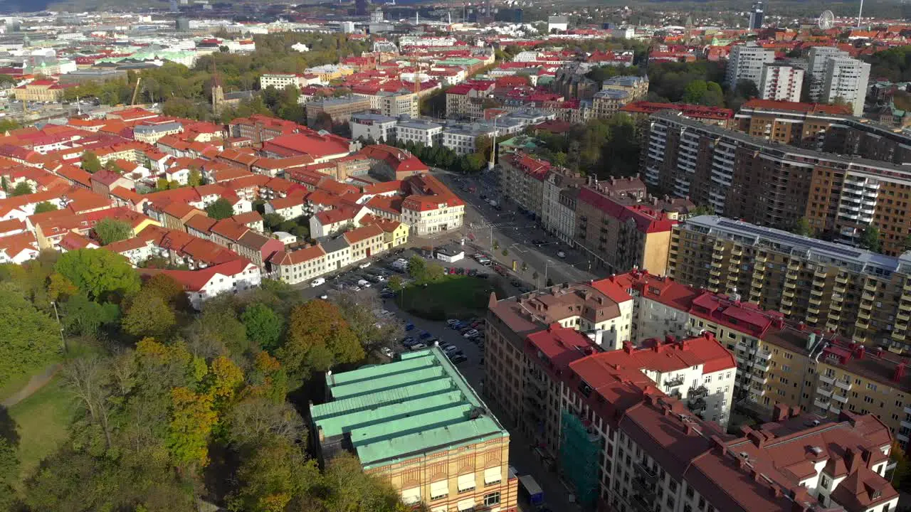 Aerial view over the homes and streets of Gothenburg Sweden Tilt up drone reveal