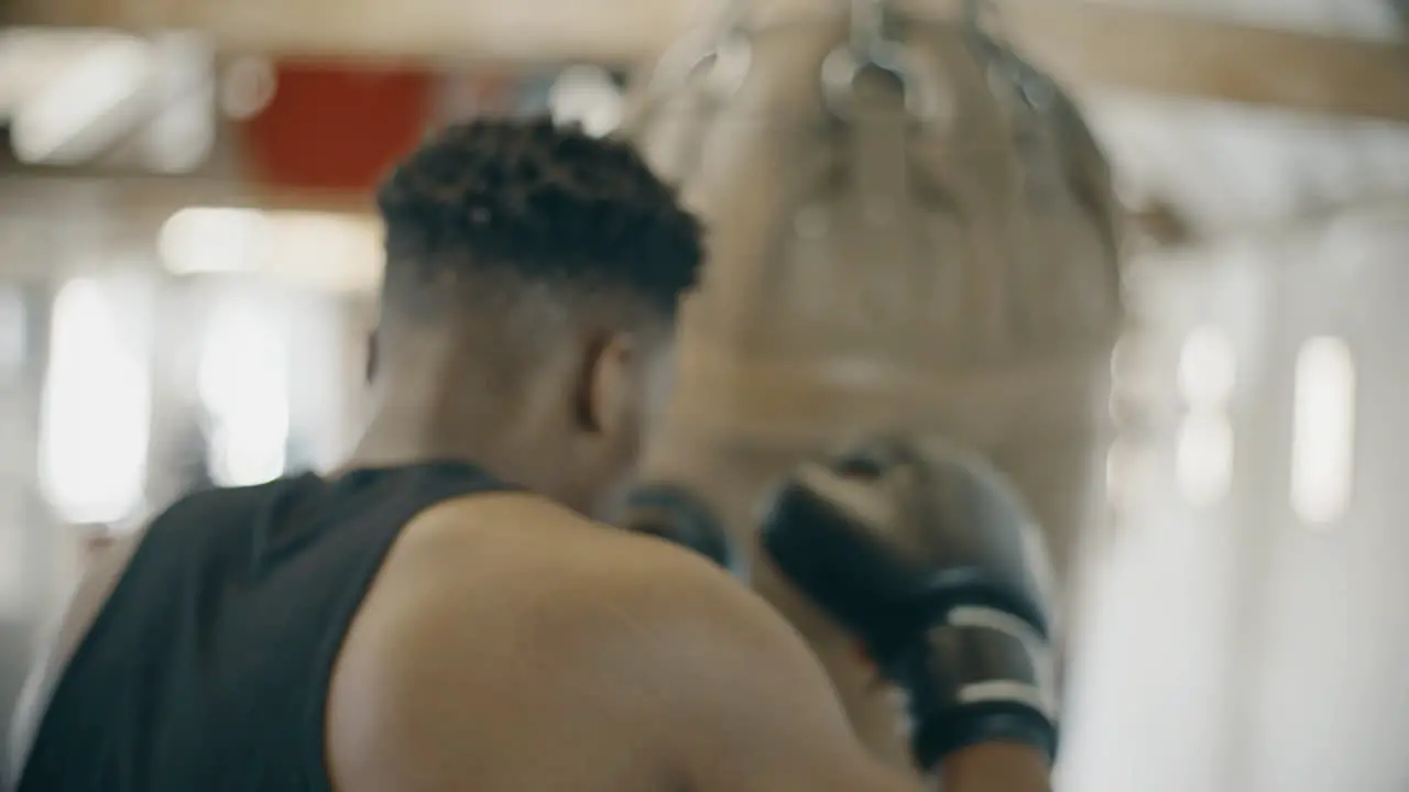 Slow Motion Boxer Training With Boxing Bag