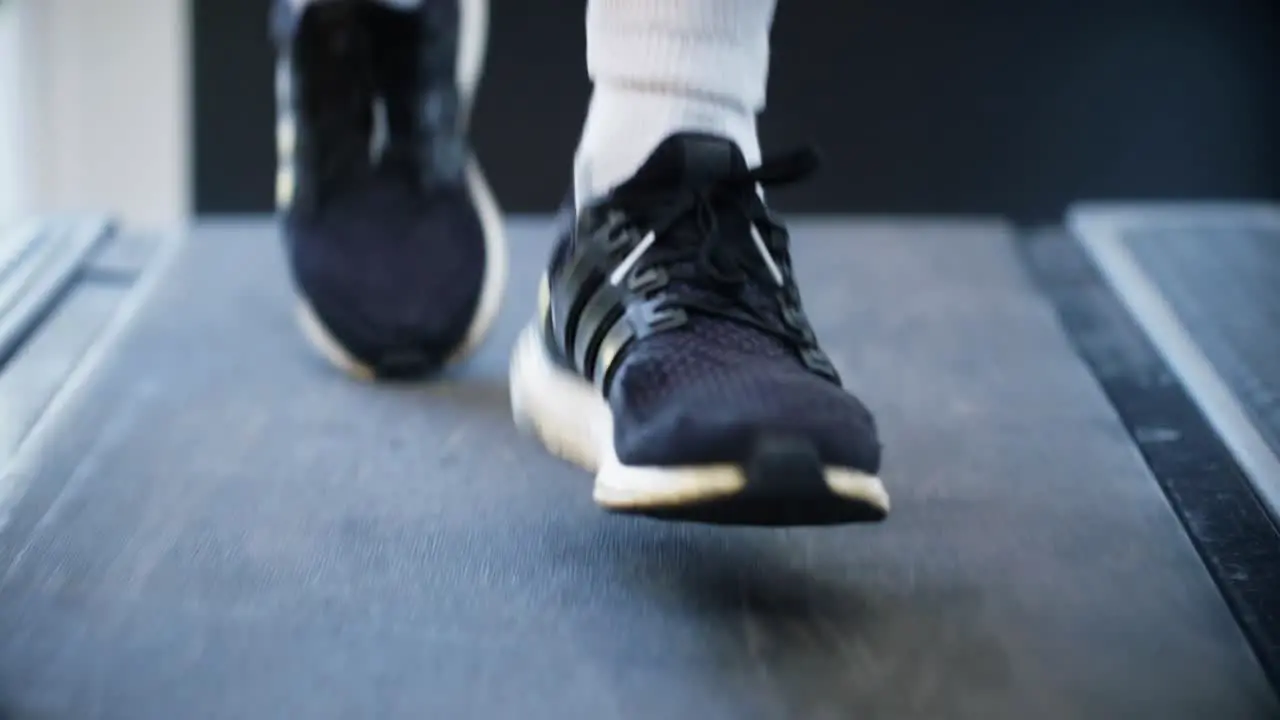 CU of Athlete Running on Treadmill