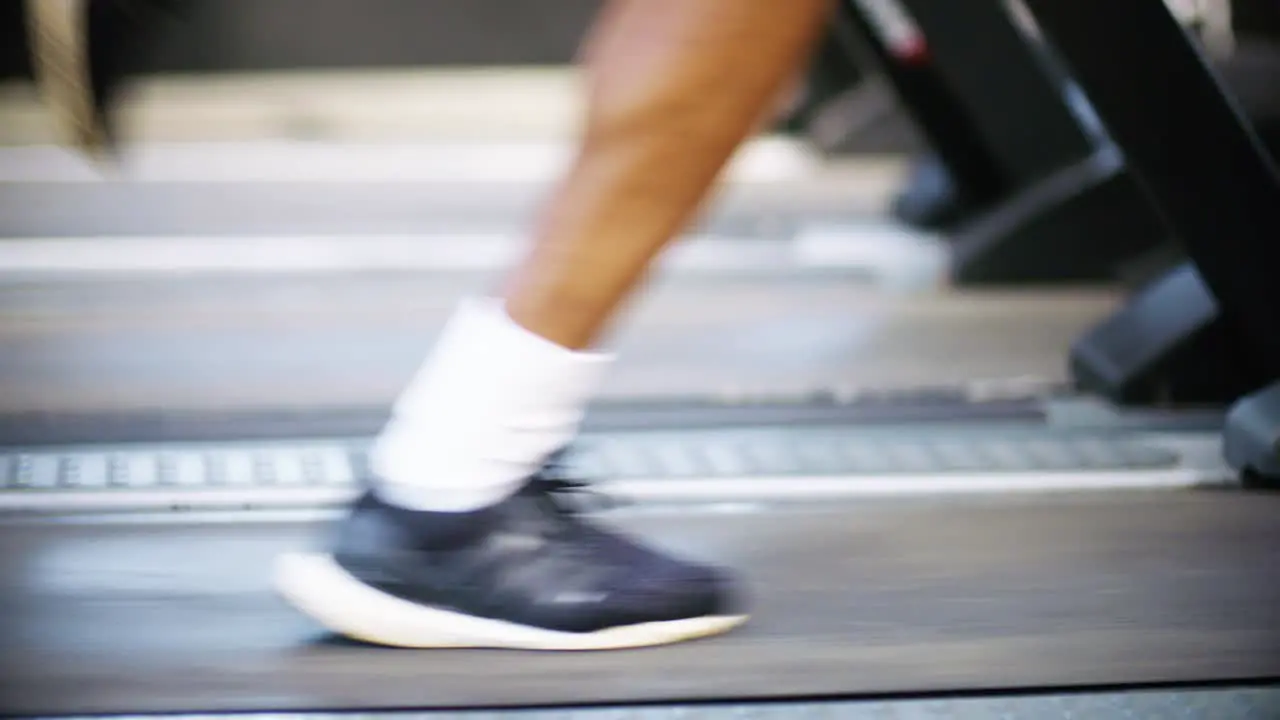 Man Running on Treadmill