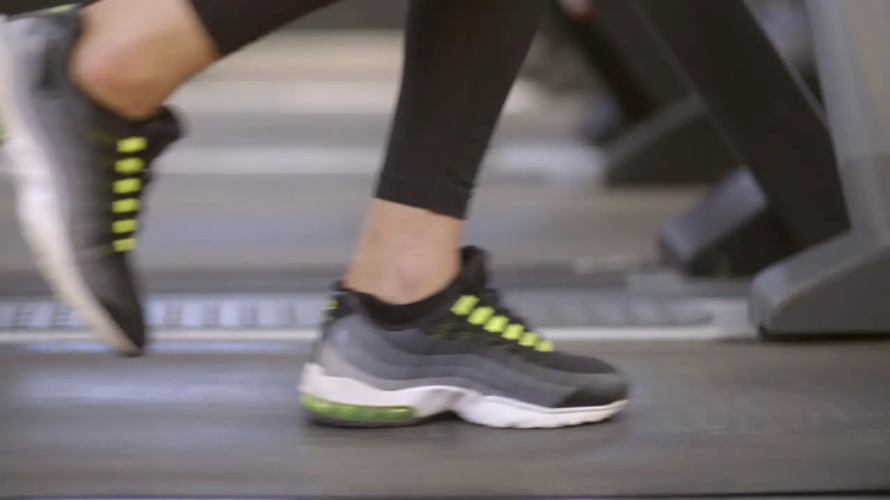 Woman Walking on Treadmill