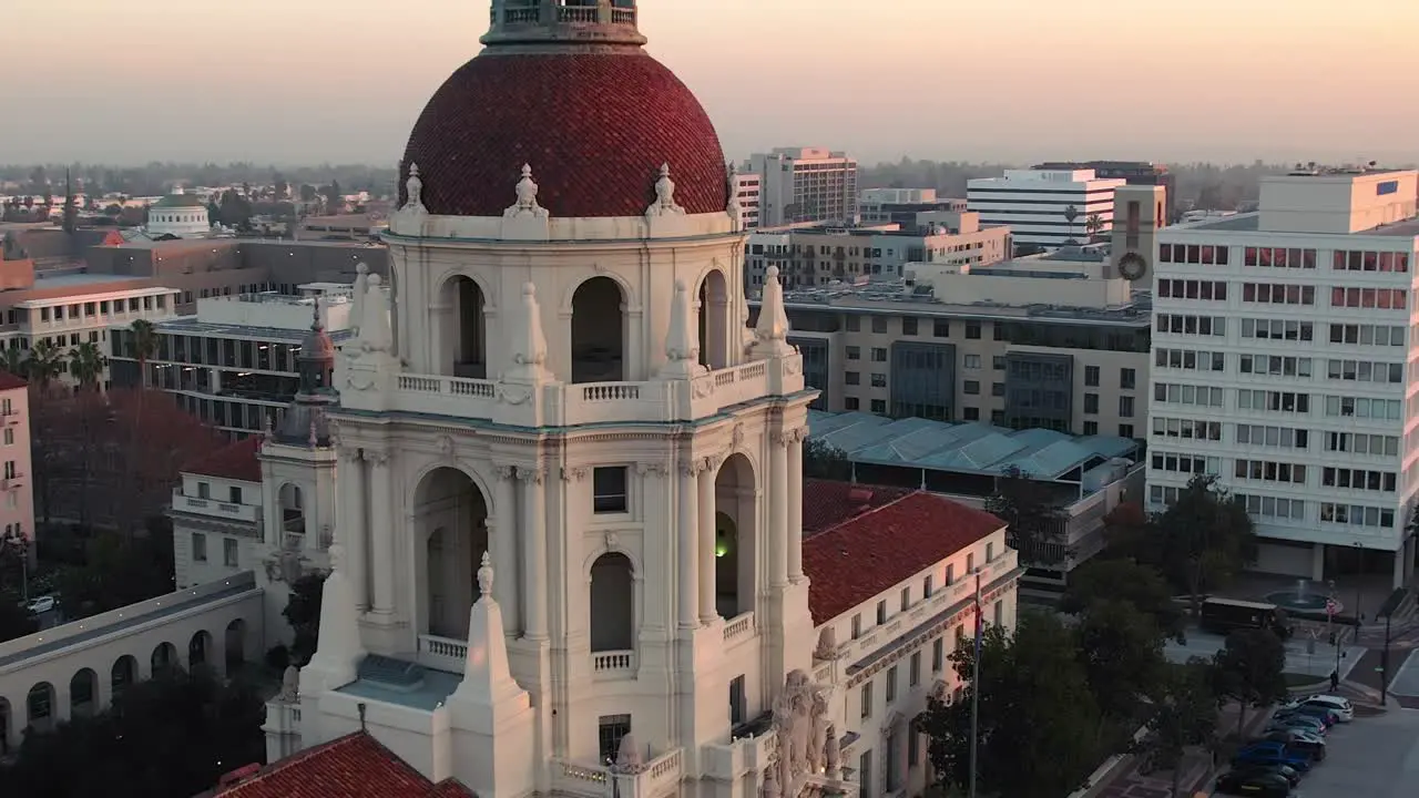 Facade aerial rising of City Hall in Pasadena California during sunset cinematic establishing view