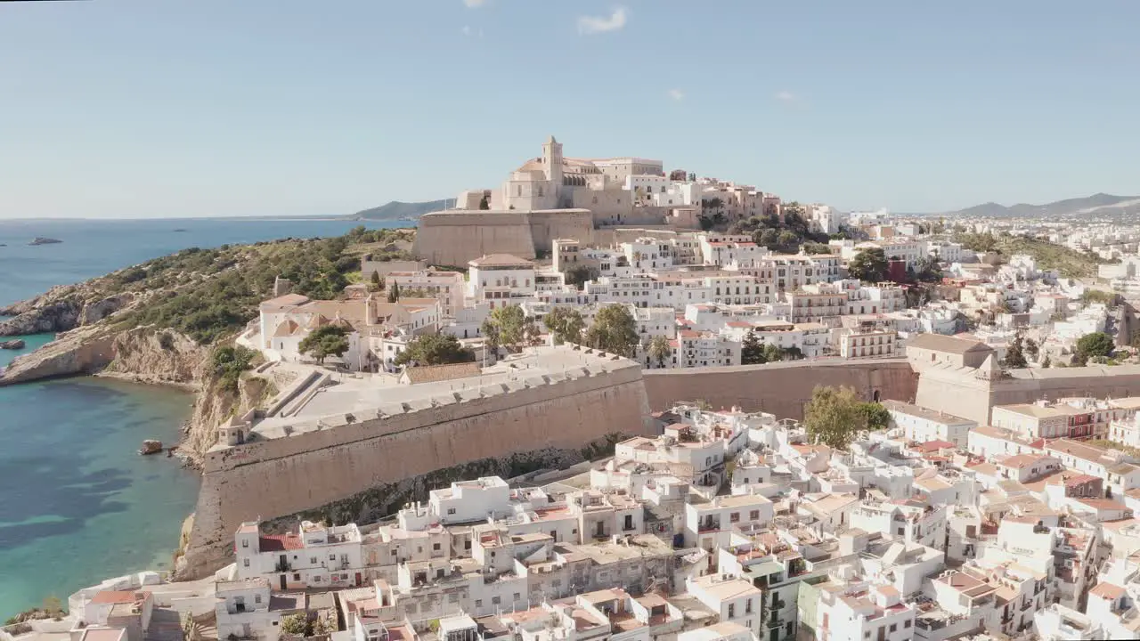 Aerial view of Ibiza city the Old Town and the city walls of Eivissa in the island of Ibiza on a sunny and clear day