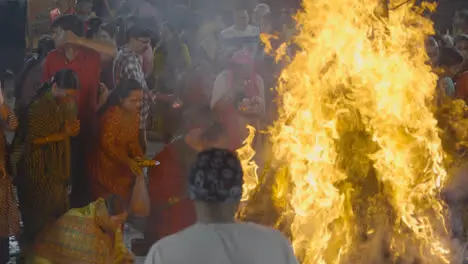 People Celebrating Hindu Festival Of Holi With Bonfire In Mumbai India 8