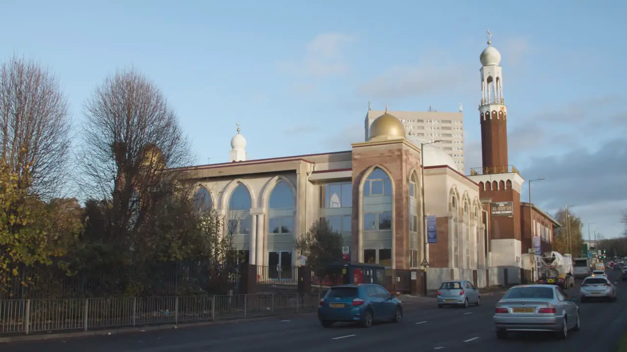 Exterior Of Birmingham Central Mosque In Birmingham UK With Traffic