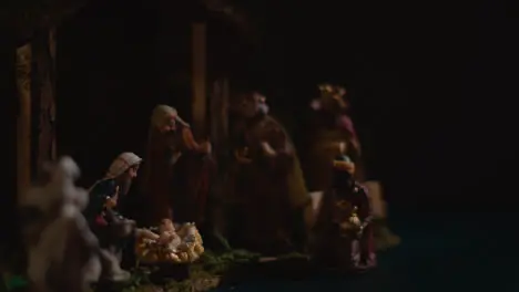 Studio Christmas Concept Of Baby Jesus In Manger With Figures From Nativity Scene 3