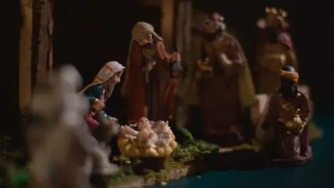 Studio Christmas Concept Of Baby Jesus In Manger With Figures From Nativity Scene 2