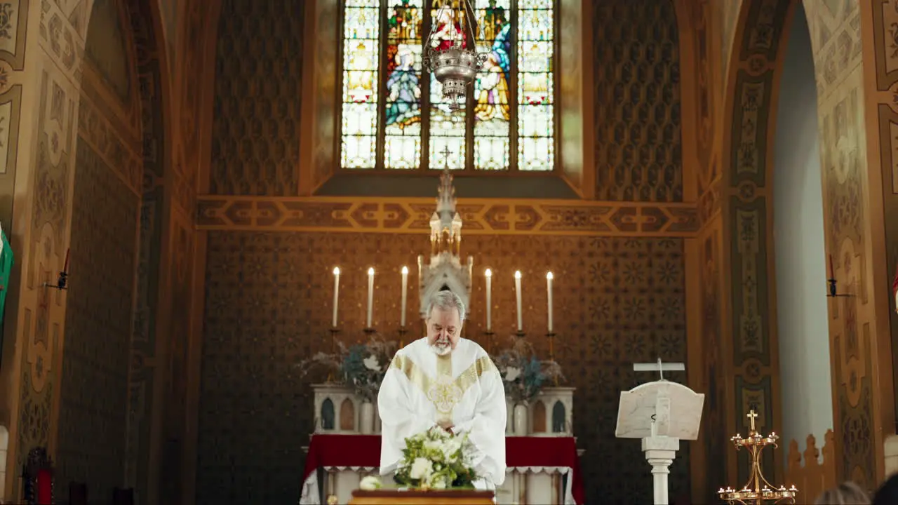 Funeral church and pastor with prayer by coffin