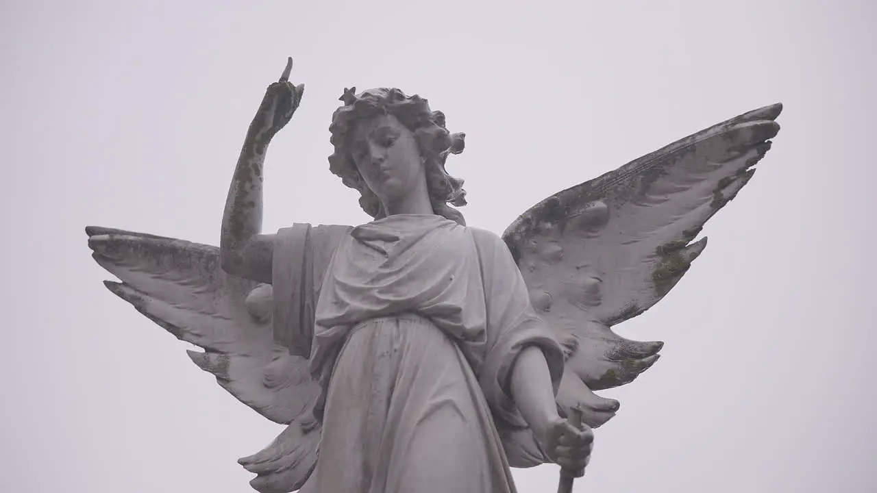 Funeral cemetery and angel on tombstone for death