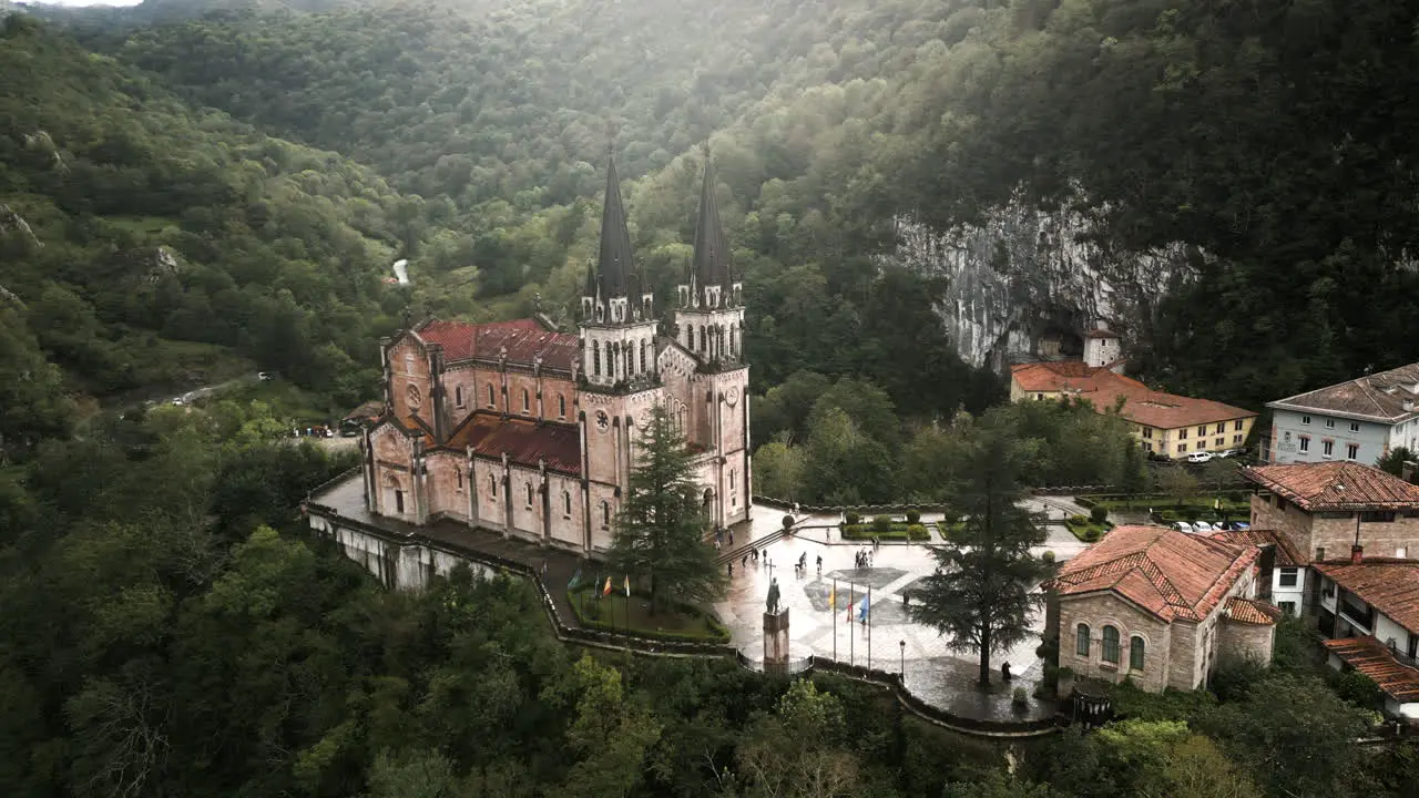 Circling Drone Angle of Santa Maria Basilica in the Northern Mountains of Covadonga Spain