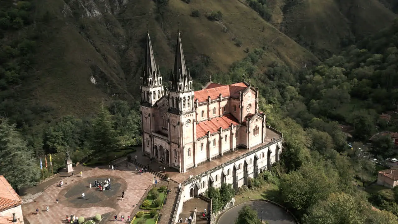 Rising Wide Drone Angle of Santa Maria Basilica in the Northern Mountains of Covadonga Spain