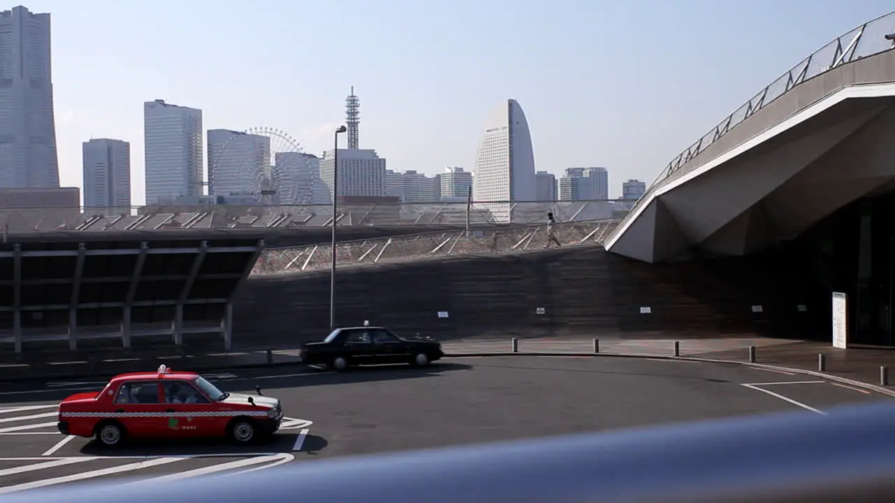 A taxi cab is parking at the Yokohama International Port Terminal