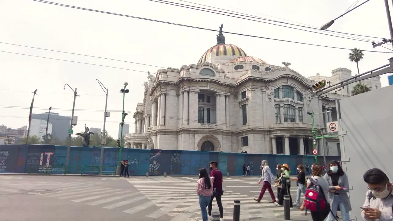 Traffic and people walking on the streets of Mexico's City downtown shot from a car perspective