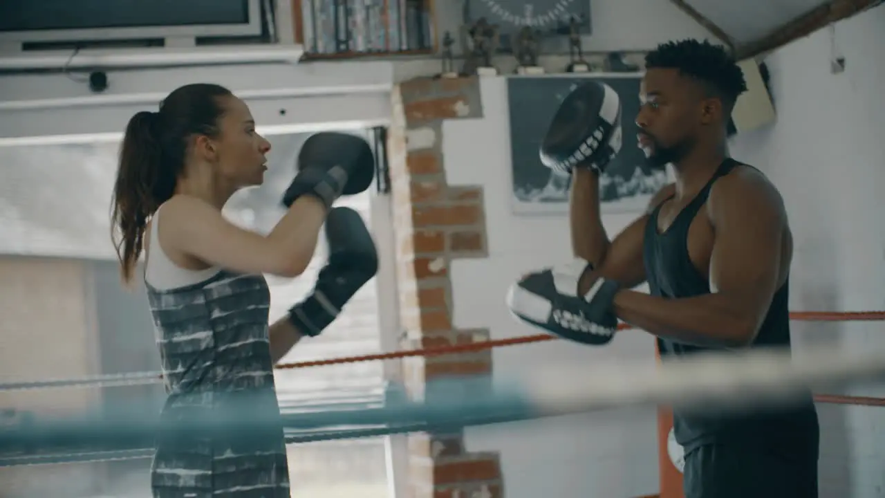 Tracking Shot of Boxers Training in Ring