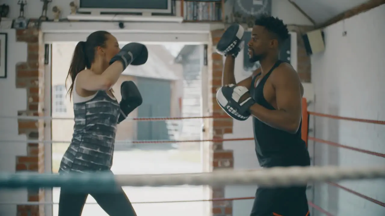 Boxers Working Together in Ring