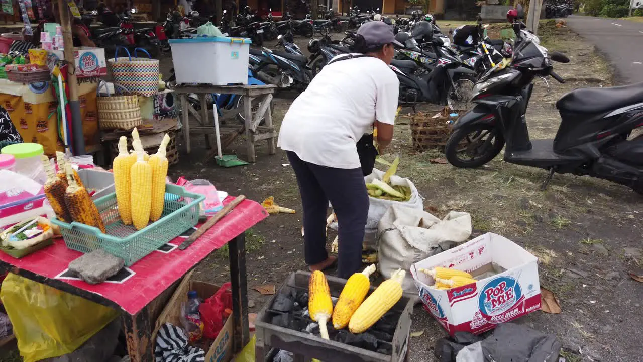 Roasted Corn and Street Food Sellers in Bali Indonesia Purnama Beach Chef Grilling Sweetcorn Local Cuisine at Sukawati Gianyar