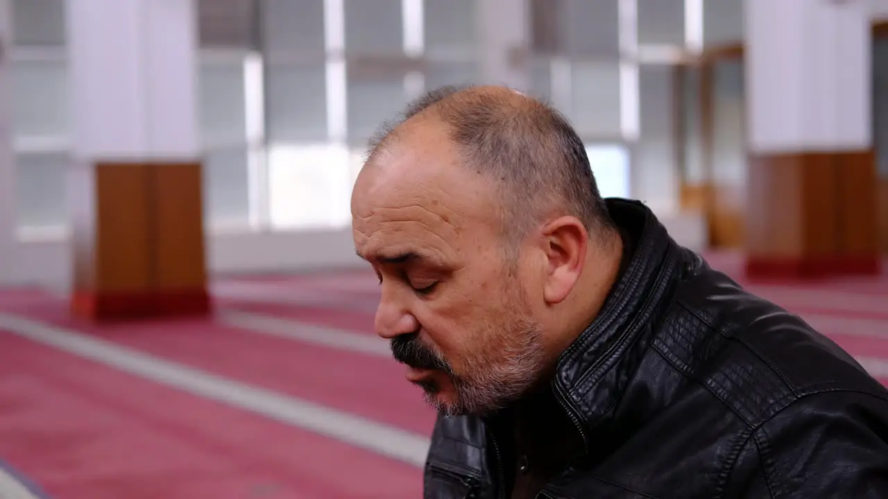 Man Raising His Hands And Praying In Mosque 1