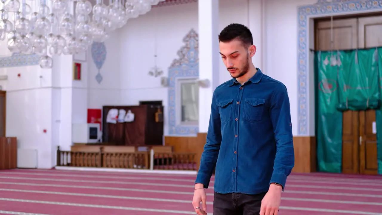 Young Man Worships in Mosque 1