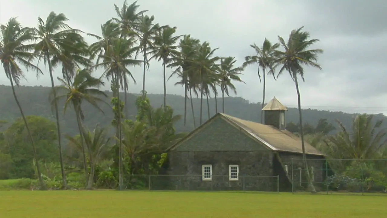 A Church Stands On A Tropical Island During A Wind Storm