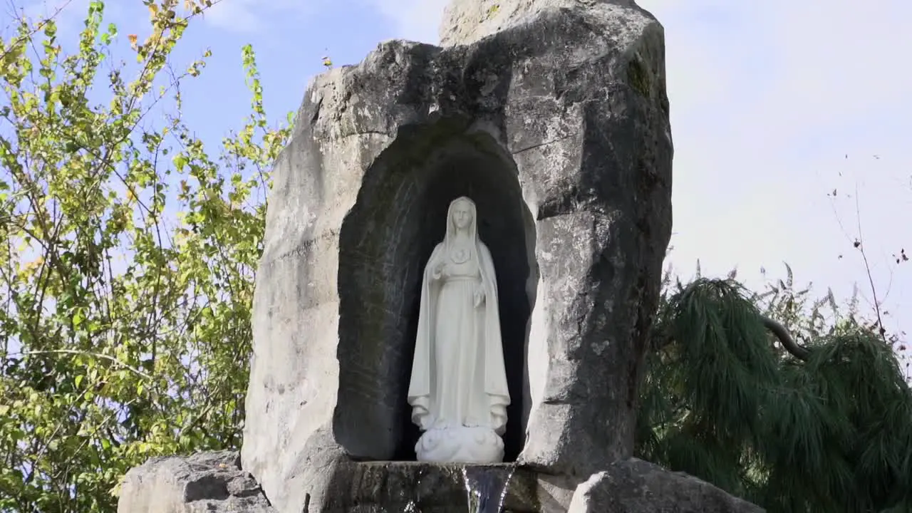 The White Virgin Mary Statue Water Fountain