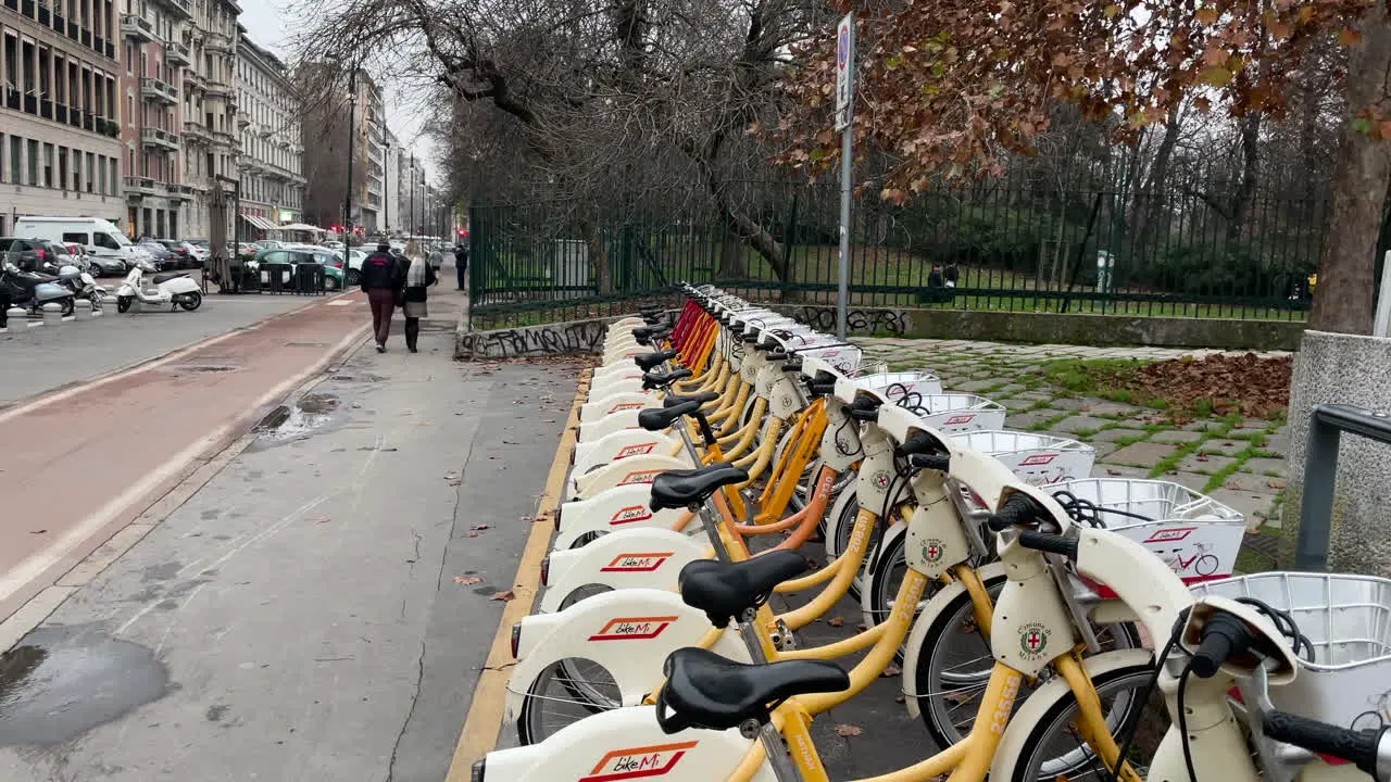 BikeMi bike rental service in Milan Italy Wide shot slow motion