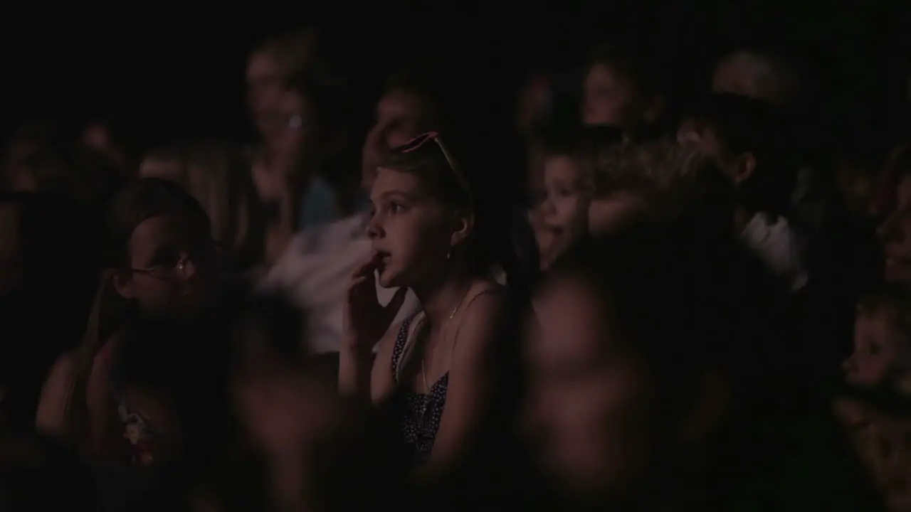 Girl in cinema or theatre