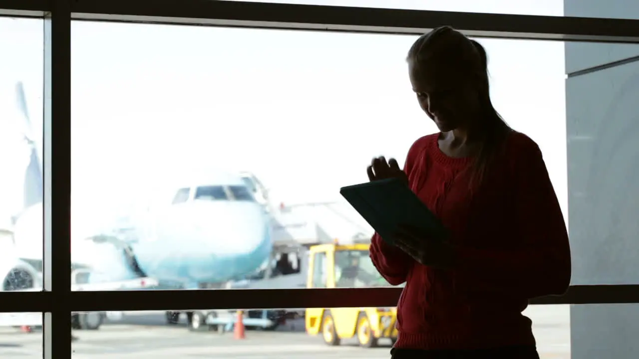 Woman with pad at the airport