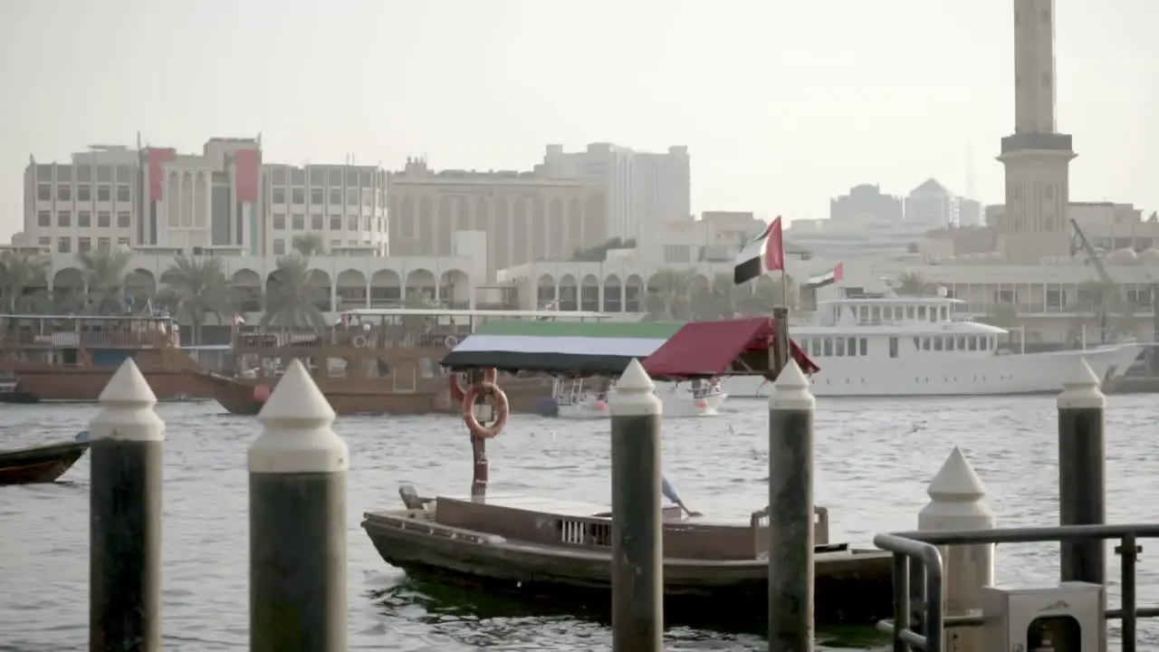 Small and large wooden boats on the Dubai Creek