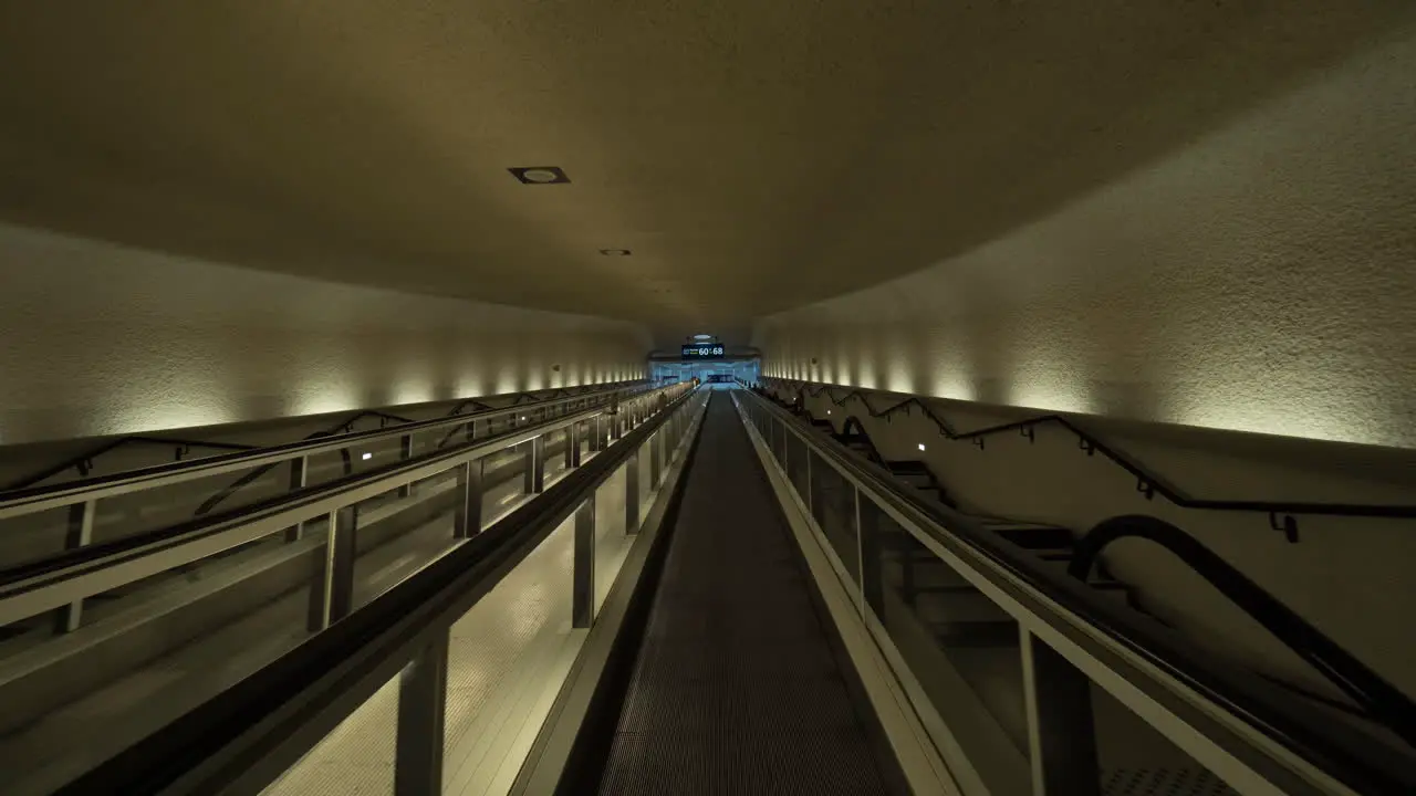 Timelapse of passing through the tunnel by travelator at the airport