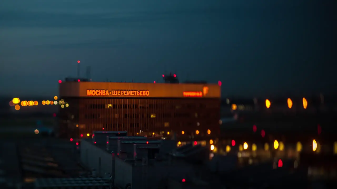 Timelapse of traffic near Sheremetyevo Airport terminal at night Moscow