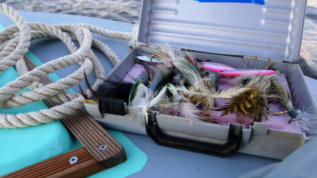 Suitcase containing of bait in motorboat 4k