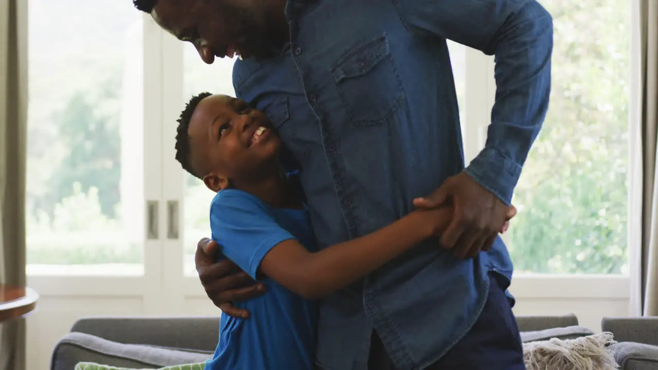 Father and son hugging each other