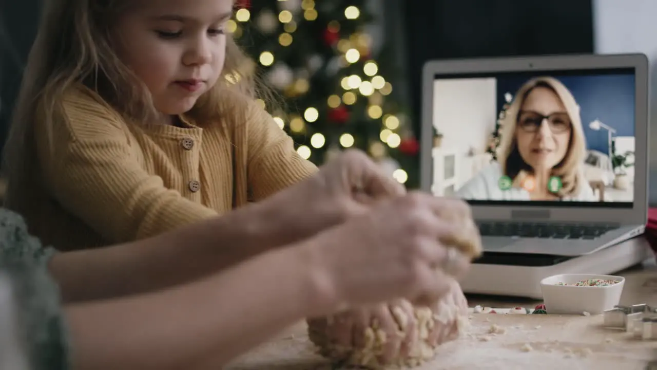 Video of multi-generation family baking via video conference