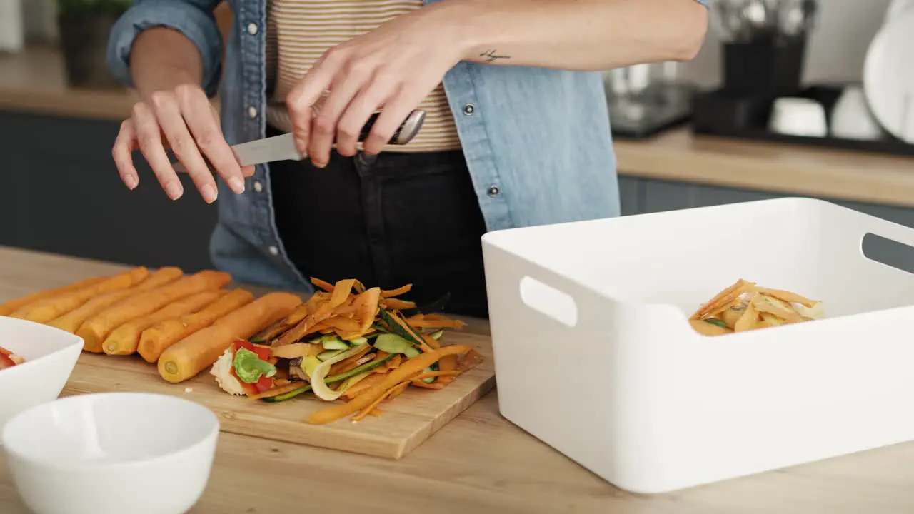 Video of woman sorting organic waste in the kitchen