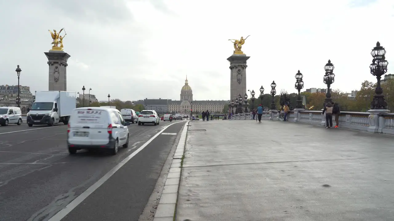 Pont Alexandre III Bridge connects the Invalides on the Left Bank to the Grand Palais and Petit Palais on the Right Bank