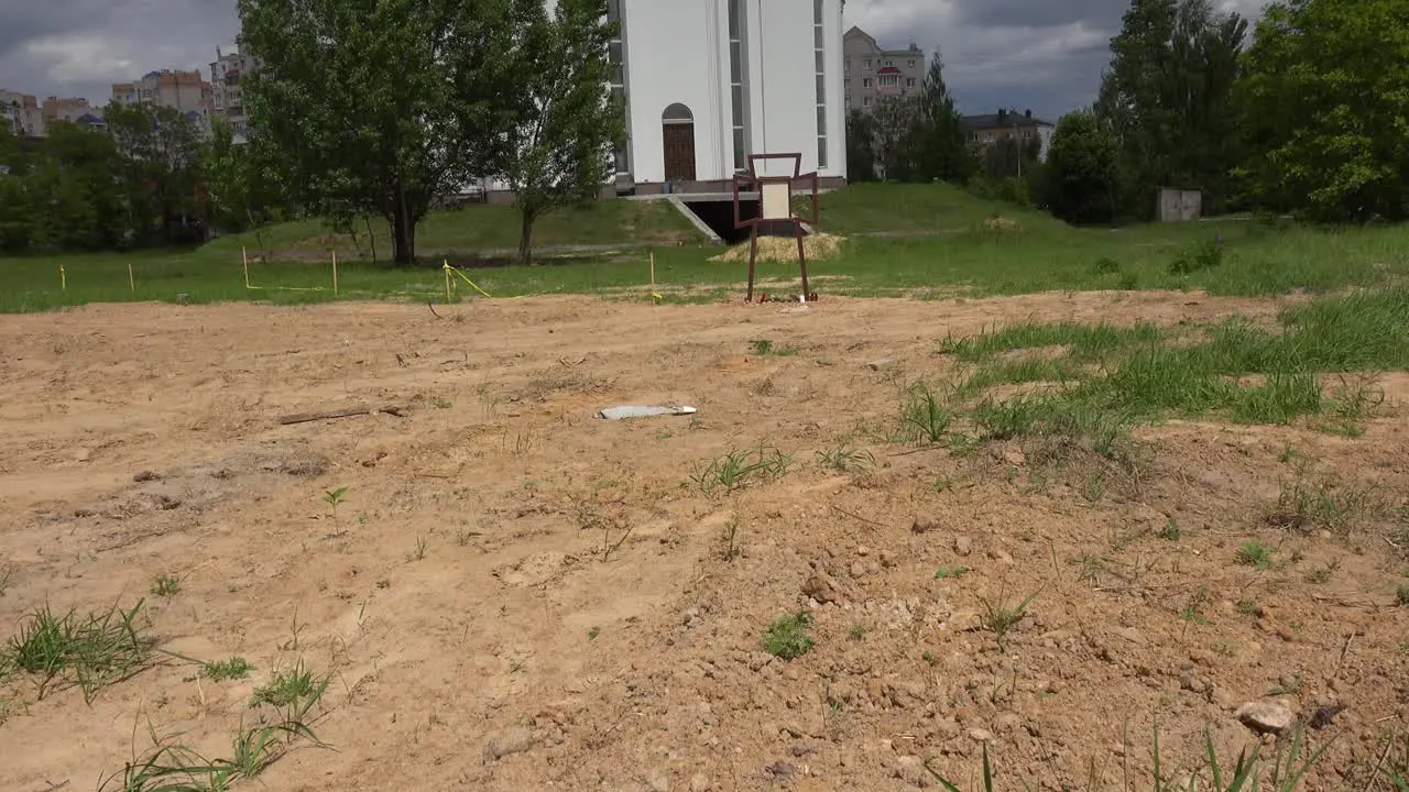 Tilt Up Of The Church Of St Andrew Pervozvannoho All Saints In Bucha Ukraine Where Dozens Of Unmarked Graves And War Crimes Victims Were Unearthed