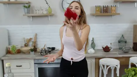 Girl recommending eating raw vegetable food Showing pepper in hands Weight loss and diet concept