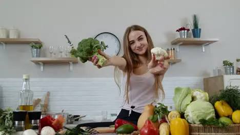 Girl recommending eating raw vegetable food Showing broccoli and cauliflower Weight loss diet