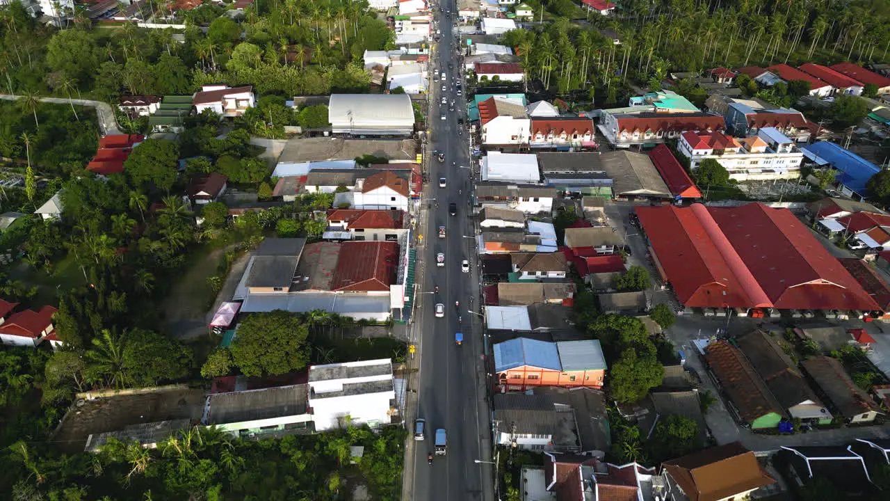 Koh Samui island township with busy street aerial drone view