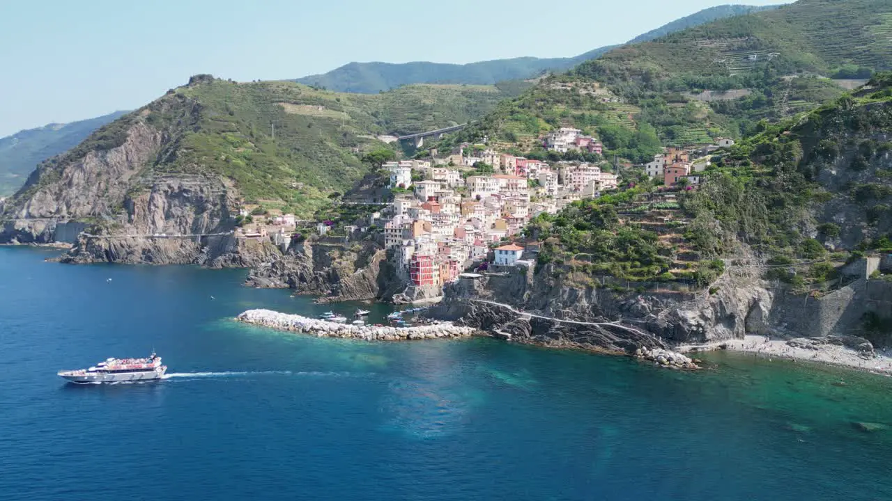 Cinque Terre Boat Tour and Riomaggiore Village in Vernazza La Spezia Liguria Italy Aerial 4k Circling