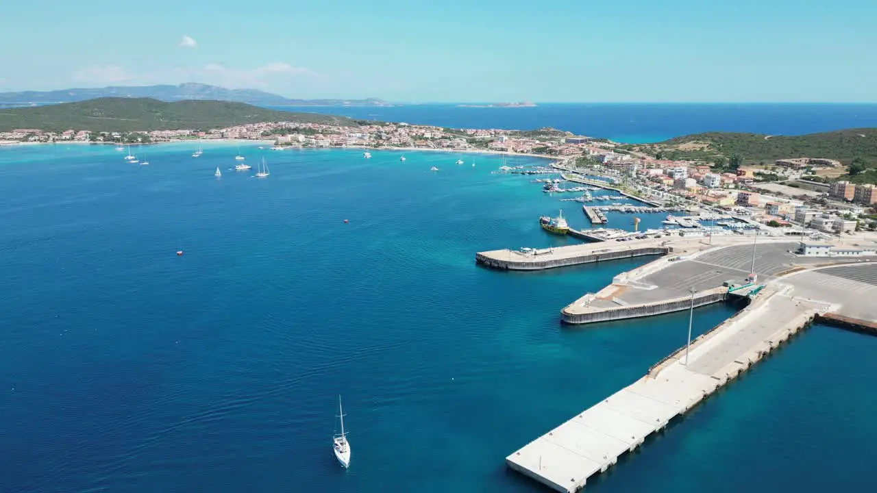 Golfo Aranci Port and docks in Sardinia Italy 4k Aerial Forward